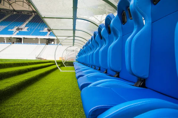 Blue bench or seat or chair of staff coach in the stadium of foo