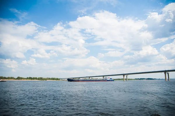 Cargo ship moving along the river