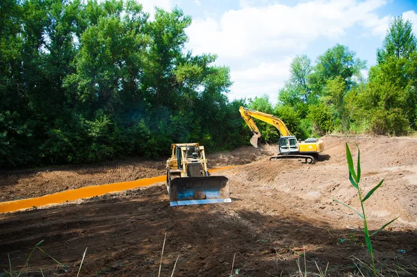 Excavator working with earth — Stock Photo, Image