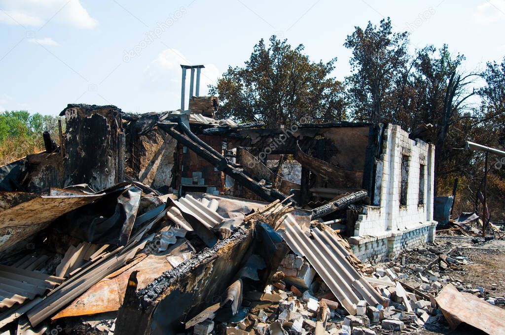 Ruins of house after big disaster - fire