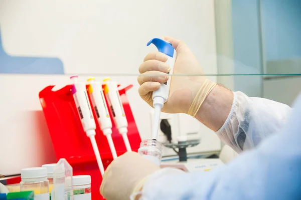 Interior of modern research laboratory. People at work in the scientific laboratory