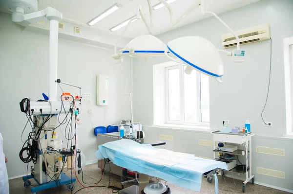 Empty modern operating room with medical technology.