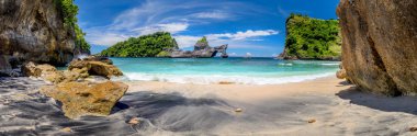 Big Panorama of idyllic tropical beach with small island and per clipart