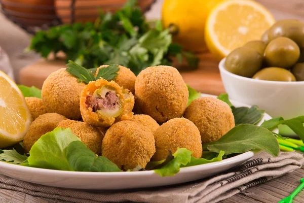 stock image Ascoli stuffed olives on white dish. 