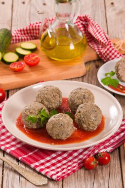 Meatballs with tomato sauce. clipart