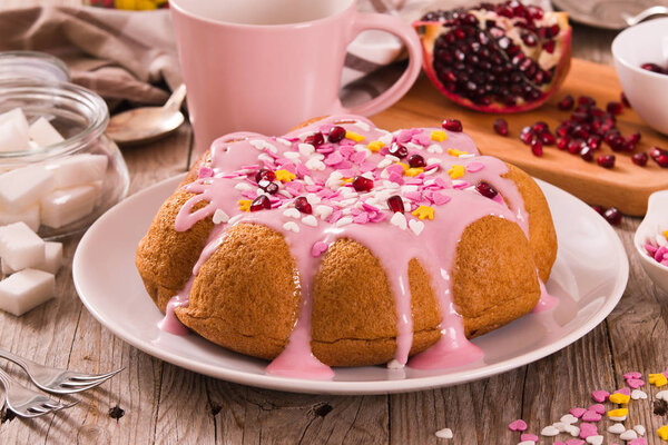Cake with pink frosting.