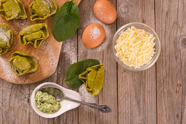 Spinach ravioli with ricotta cheese filling.