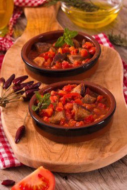 Domates sosu içinde marinated Domuz loin.