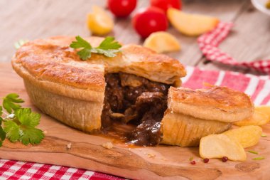Biftekli börek patates kızartması ile.