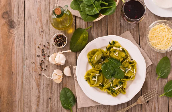 Spinach ravioli with ricotta cheese filling.