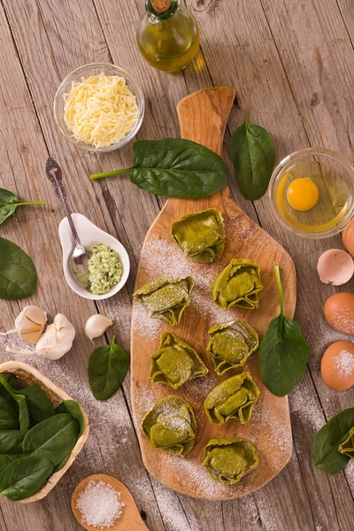 Spinach ravioli with ricotta cheese filling.