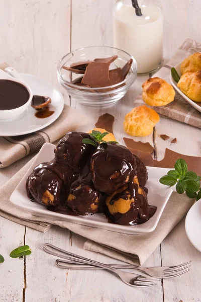 Chocolate Profiteroles Whipped Cream White Dish — Stock Photo, Image