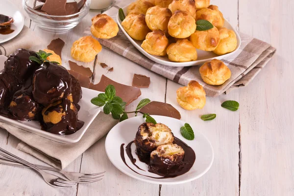 Chocolate Profiteroles Whipped Cream White Dish — Stock Photo, Image