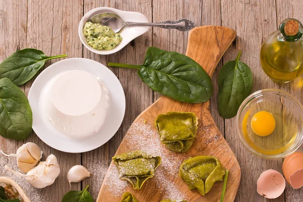 Spinach ravioli with ricotta cheese filling.