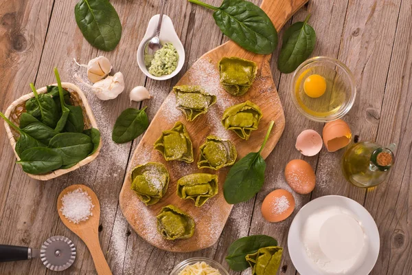 Spinach ravioli with ricotta cheese filling.