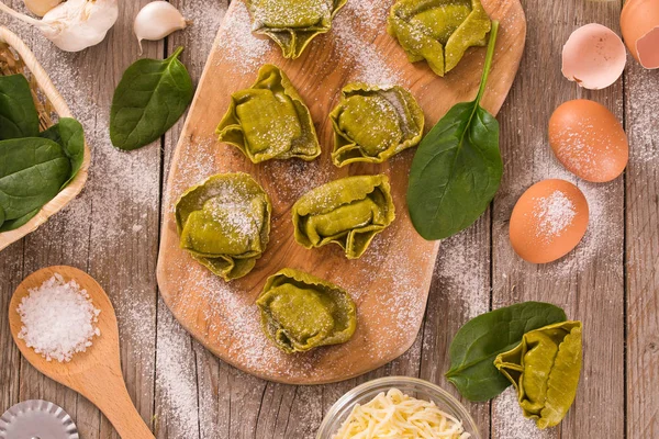 Spinach ravioli with ricotta cheese filling.