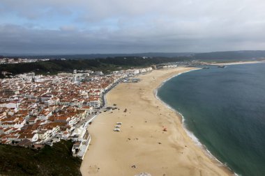 Nazare Portekiz, bazı en iyi plajları Portekiz olmak tarafından kabul en popüler sahil beldelerinden biridir.