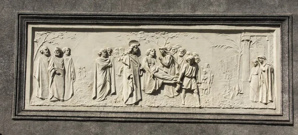 Turin, Italy, June 27, 2019:  Bas-relief from the facade of the — Stock Photo, Image