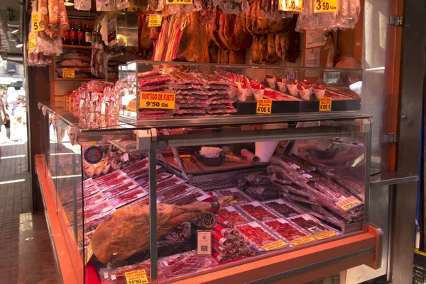 Barcelona, Spain, 22 June 2019: Stall with meat products at Ramb — Stock Photo, Image