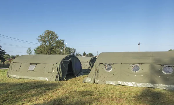 Large, green, military canvas tents — Stock Photo, Image