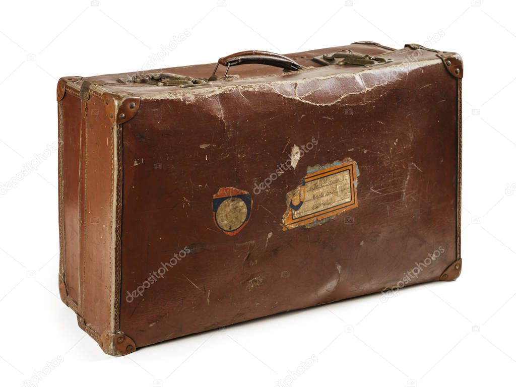 Photo of an old leather suitcase. Isolated with clipping path included.