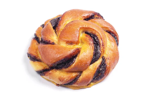 Beyaz zemin üzerine çikolata kremalı topuz yakın çekim