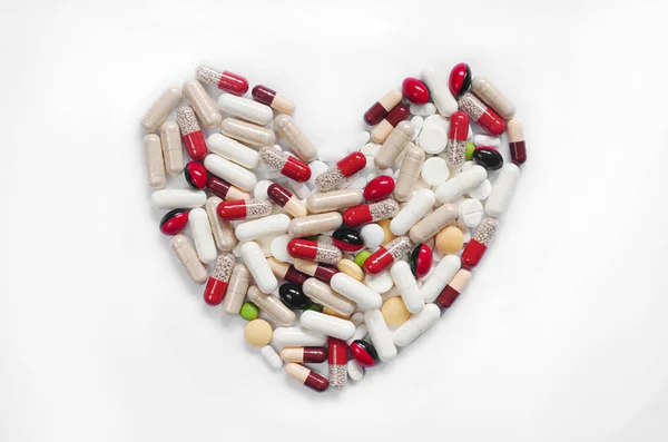 Medication Capsules Pills Shape Heart White Background Top View — Stock Photo, Image