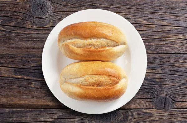 Loaves Small White Bread Plate Old Wooden Table Top View — Stock Photo, Image