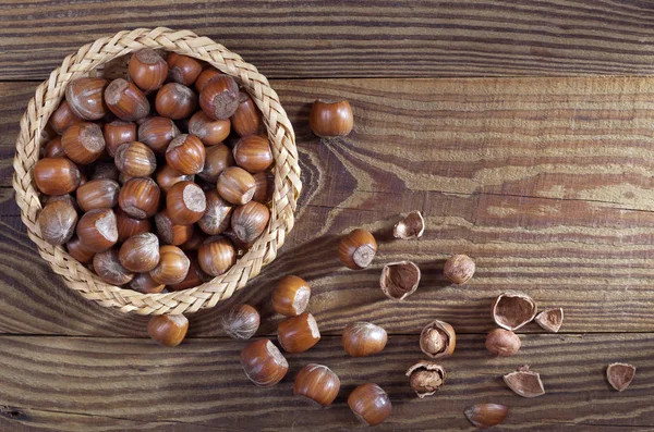 Hazelnuts Wicker Bowl Scattered Whole Kernels Nutshell Located Old Wooden — Stock Photo, Image