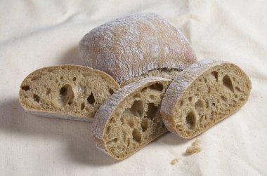Ciabatta ekmeği kumaş bir arka plan üzerinde Kapat