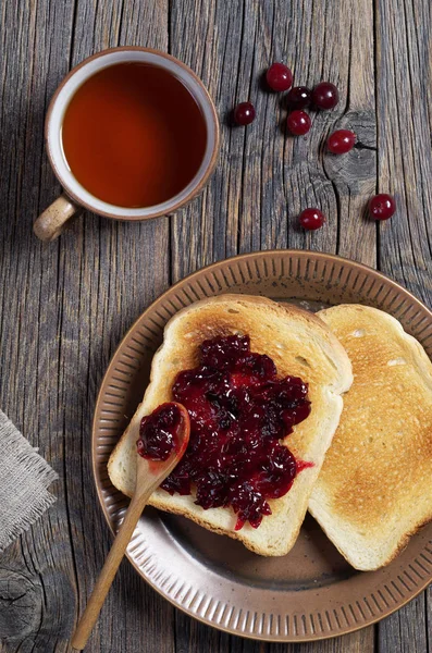 Toasted Bread Cranberry Jam Berries Cup Tea Old Wooden Table — Stock Photo, Image