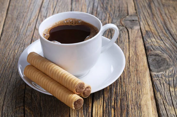 Coffee and wafer rolls with chocolate