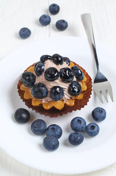 Blueberry cheesecake in plate — Stock Photo, Image