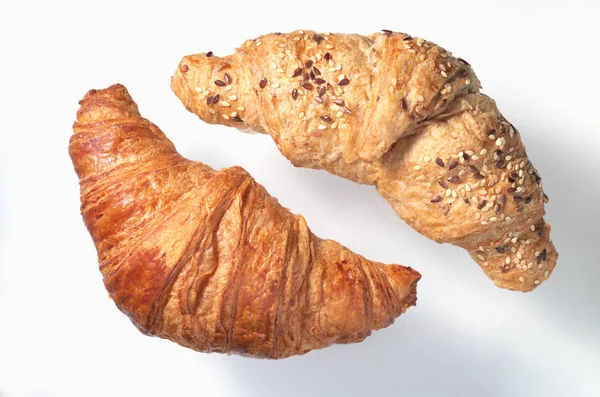 Två olika croissanter — Stockfoto