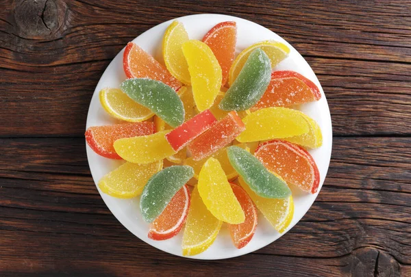 Marmelad Form Citrusfrukter Skivor Platta Trä Bakgrund Ovanifrån — Stockfoto
