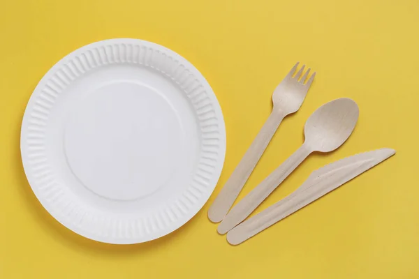 Disposable Plate Wooden Cutlery Yellow Background Top View — Stock Photo, Image