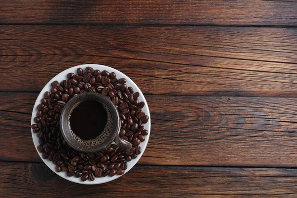 Xícara Café Feijão Assado Uma Mesa Madeira Vista Superior Com — Fotografia de Stock