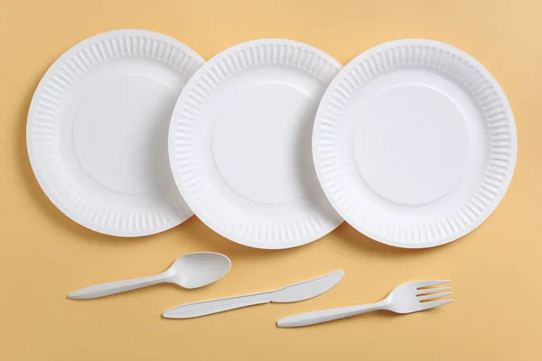 Disposable Plates Cutlery Yellow Background Top View — Stock Photo, Image