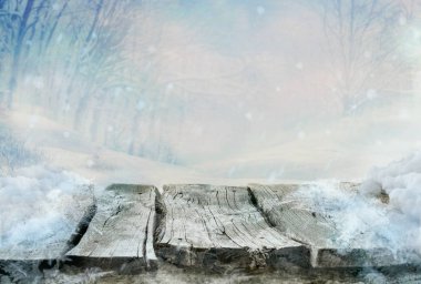 Winter design. Christmas background with Frozen wooden table with landscape. Snow and ice on wooden table with snowy forest clipart