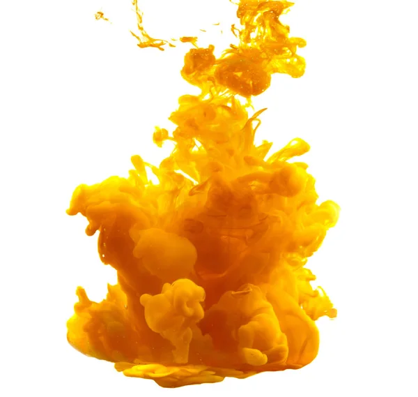 Tinta en el agua. Salpicadura de tinta amarilla —  Fotos de Stock