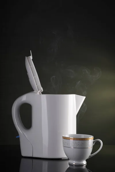 Tea Cup and Electric Kettle with Steam