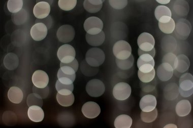 Krem renkli bokeh topları, bulanık çelenk, doku, arka plan, fotoğraf odak dışında, kopya alanı, soyut