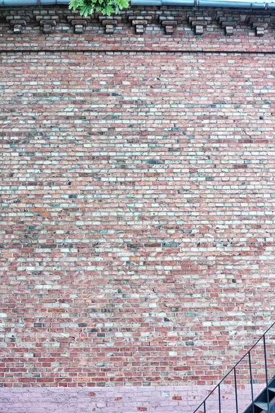 Ściana Murowana Kolorowego Ceglanego Budynku Mieszkalnego — Zdjęcie stockowe