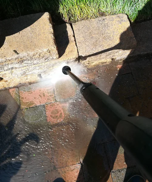 high pressure cleaner in action