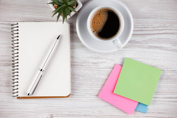 Items for business on a light background on the table, view from the top