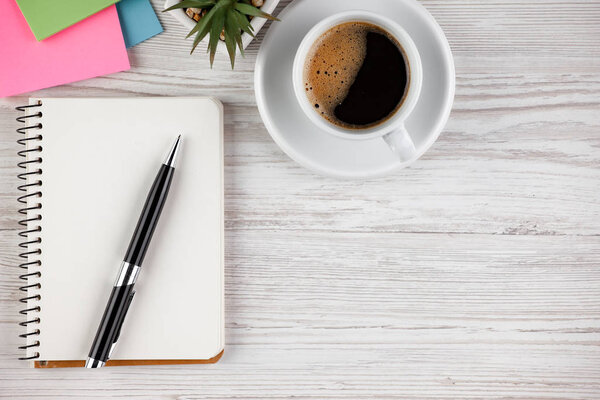 Items for business on a light background on the table, view from the top