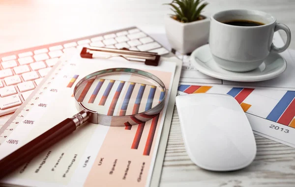 Items for business on a light background on the table, view from the top