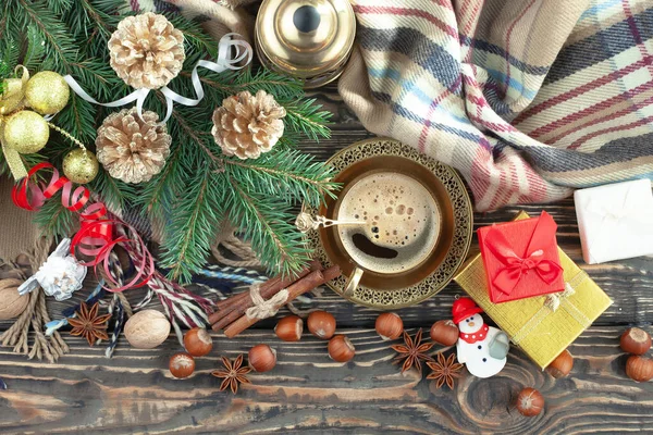 Merry Christmas card with gifts and, coffee and Christmas decorations.