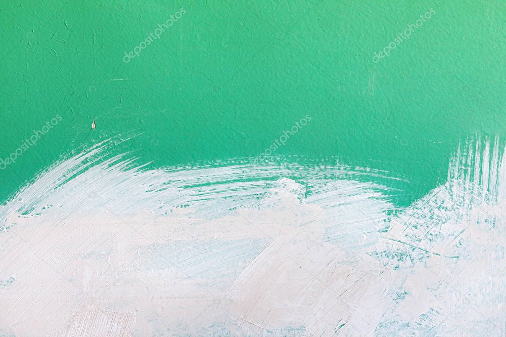 Half plastered old green wall background with white putty strokes and old green paint