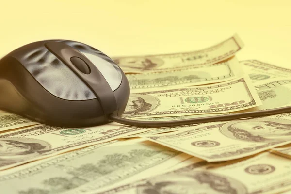 Computer mouse on 100 dollar banknotes — Stock Photo, Image